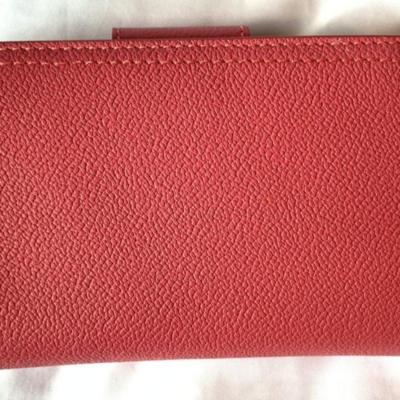 Wallet that is in salmon pink color - Picture 2 of 5